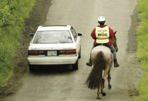 Riders who wear safety vests remind drivers that they can help in avoiding animal-vehicle conflicts.  Photograph by: Ray Smith, Victoria Times Colonist